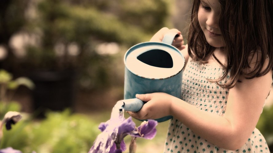 4589-child-girl-watering-flowers.jpg